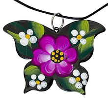 Load image into Gallery viewer, Oaxacan Black Clay hand-sculpted butterfly-shaped necklace with painted floral details in purple
