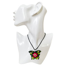 Load image into Gallery viewer, Oaxacan Black Clay hand-sculpted butterfly-shaped necklace with painted floral details in red
