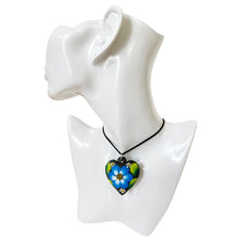 Load image into Gallery viewer, Oaxacan Black Clay hand-sculpted heart-shaped necklace with painted floral details in blue
