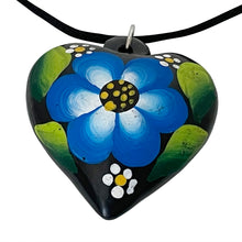 Load image into Gallery viewer, Oaxacan Black Clay hand-sculpted heart-shaped necklace with painted floral details in blue

