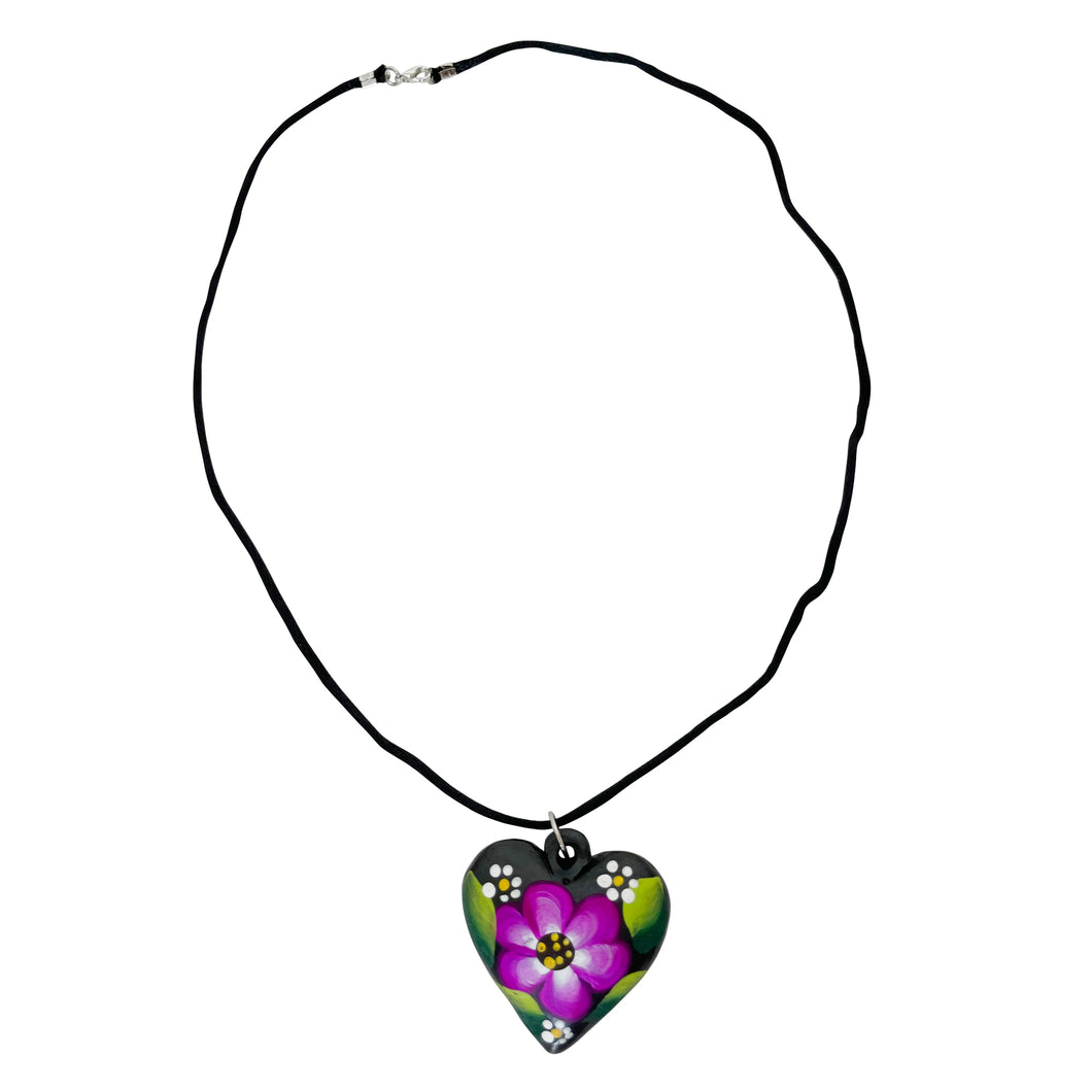 Oaxacan Black Clay hand-sculpted heart-shaped necklace with painted floral details in purple